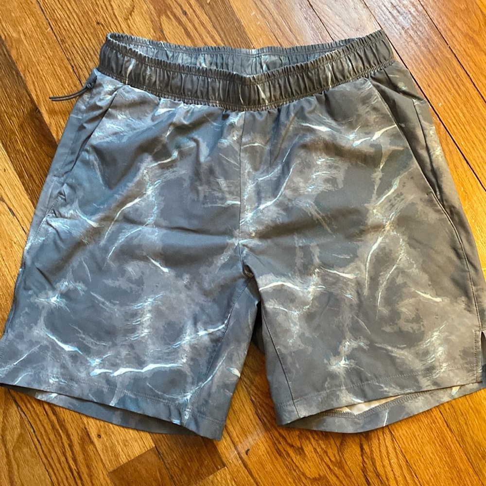 Small men’s camo style All In Motion shorts from Target